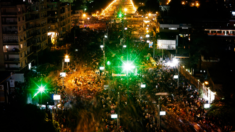 Illustration for article titled Egyptian Protesters Paint Helicopter With Hundreds of Laser Pointers